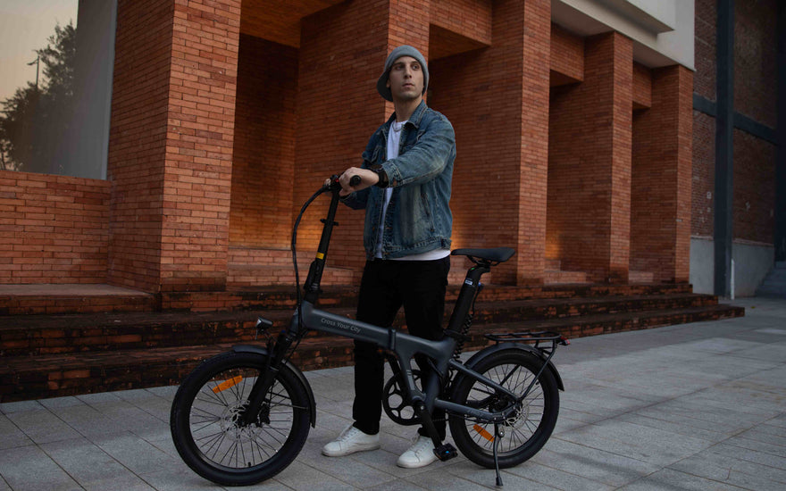 E-bike rider navigating mixed London city terrain with traffic, flat roads, and uneven urban surfaces.