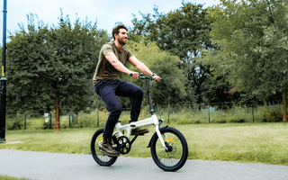 ADO e-bike on a UK street, demonstrating safety and electric bike parts for commuting