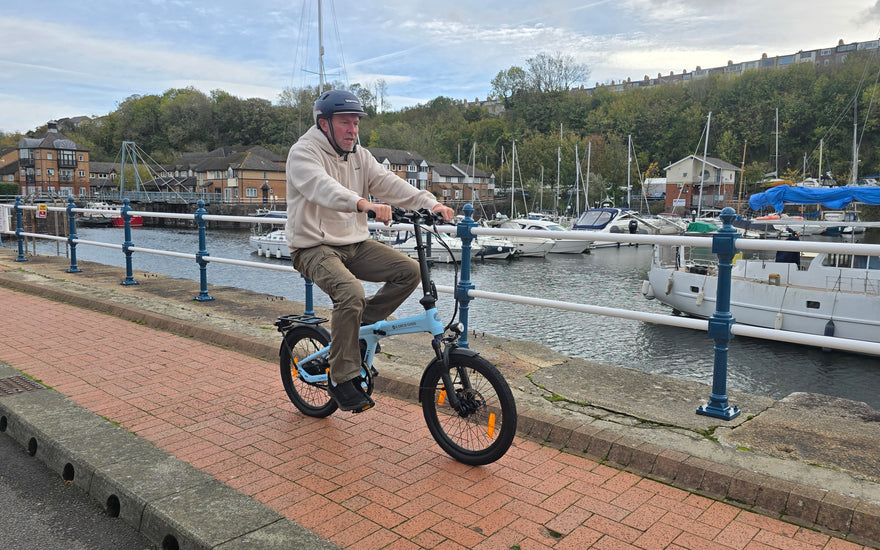 Illustration of safe e-bike riding practices and gear tips to avoid common UK e-bike crash risks including braking control and balanced riding posture.
